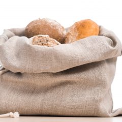 Homemade bread in a natural linen bag for storage